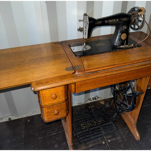 179 - Singer sewing machine on a metal base