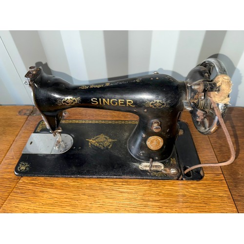 179 - Singer sewing machine on a metal base