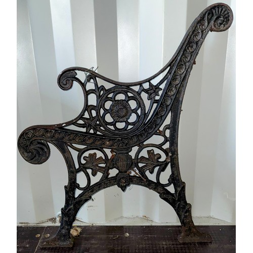 181 - Pair of cast iron bench ends decorated with flower details, approx. 78 cm tall at back