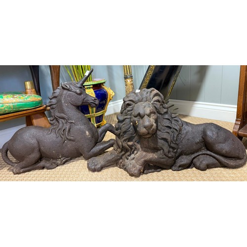 178 - A pair of cast iron early 20th century lion and unicorn approx size of the lion 66cm x 36cm and size... 