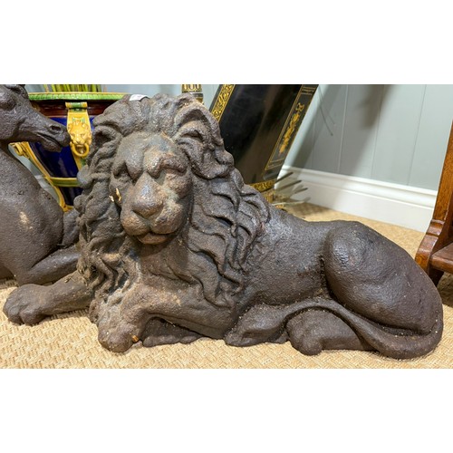 178 - A pair of cast iron early 20th century lion and unicorn approx size of the lion 66cm x 36cm and size... 