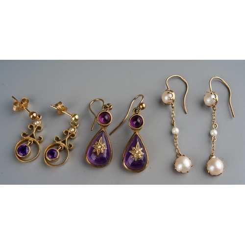 695 - A collection of three pairs of earrings, to include a pair of 9ct yellow gold amethyst cabochon earr... 