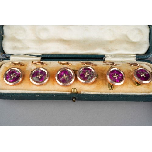 699 - Two sets of cased early 20th century dress studs, the circular case to include a set of six mother o... 