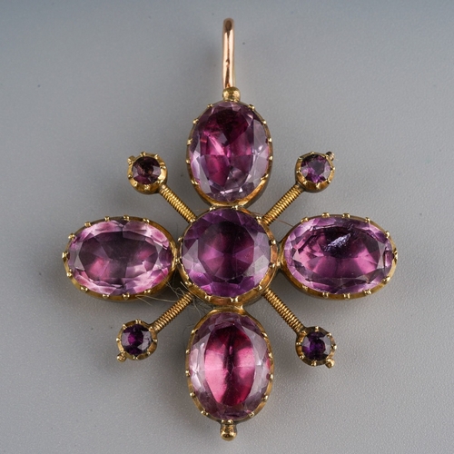 708 - A Georgian gold pendant, set throughout with foil backed amethysts, approx length (including hinged ... 