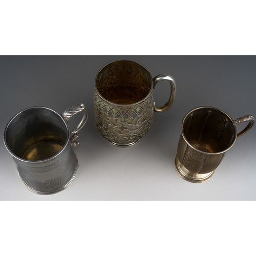 717 - Three various silver Christening cups to include: 
1. Victorian Aesthetic chased and engraved with b... 