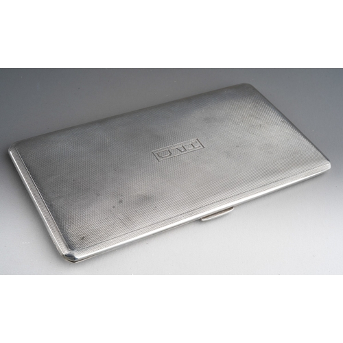 718 - A George V silver engine turned cigarette case, engraved with initials, hallmarked by W H Manton, Bi... 