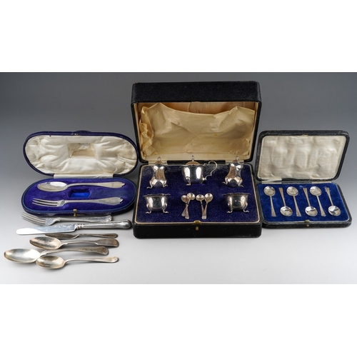 720 - A collection of silver to include: a boxed Georgian style five piece condiment set comprising pair o... 