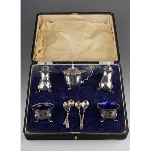 720 - A collection of silver to include: a boxed Georgian style five piece condiment set comprising pair o... 