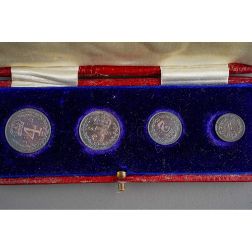 723 - An Edwardian four coin Maundy Money set of 1903,  comprising four, three, two and onepence coins, in... 