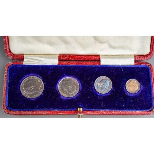 723 - An Edwardian four coin Maundy Money set of 1903,  comprising four, three, two and onepence coins, in... 