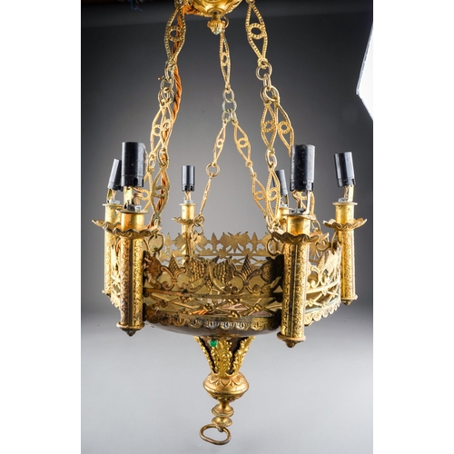 741 - A Gothic Revival six light gilt metal chandelier, the lights above pierced gallery rail, applied wit... 