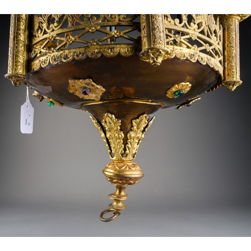 741 - A Gothic Revival six light gilt metal chandelier, the lights above pierced gallery rail, applied wit... 