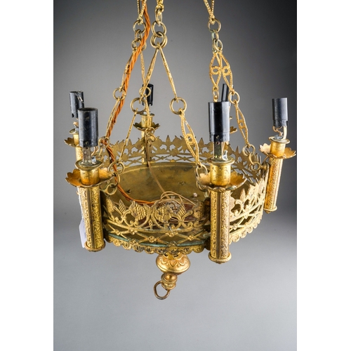 741 - A Gothic Revival six light gilt metal chandelier, the lights above pierced gallery rail, applied wit... 