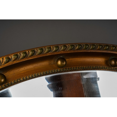 750 - A J W Morris & Co Faversham mahogany cased mantle clock together with a Georgian style gilt wood ova... 