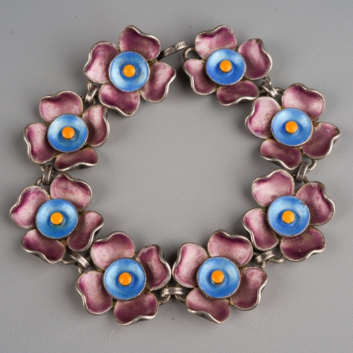 899 - Sterling silver and enamel flower link bracelet, gross weight 28g, marked sterling silver to all par... 