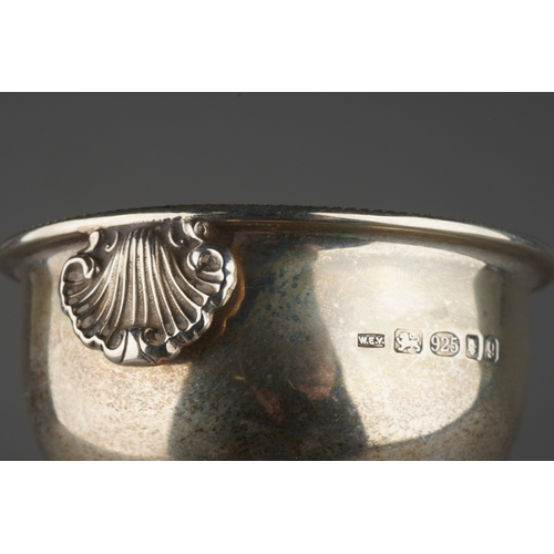 908 - An Elizabeth II silver wine funnel, two section, with gadrooned rims and shell shaped clip, sponsors... 