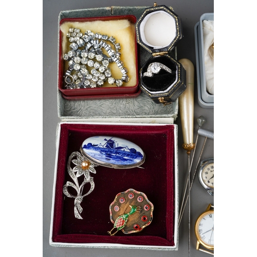 909 - A small parcel of costume jewellery and ladies and gents wrist watches, including a 925 silver dress... 