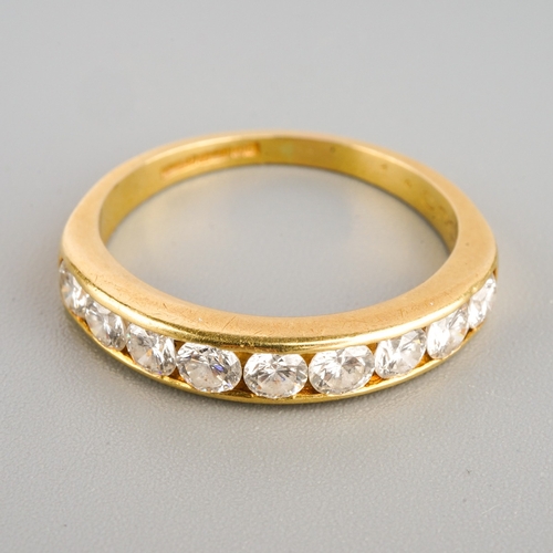 913 - An 18ct diamond half eternity ring, set with nine stones totalling 1.00 carat, hallmarked C.G & S, B... 