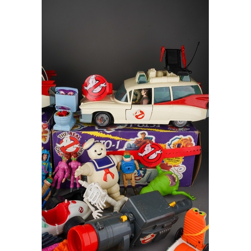 914 - A box and a bag of Kenner The Real Ghostbusters toys including 2 Ecto-1 Vehicles with boxes with cha... 