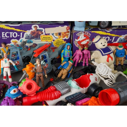 914 - A box and a bag of Kenner The Real Ghostbusters toys including 2 Ecto-1 Vehicles with boxes with cha... 