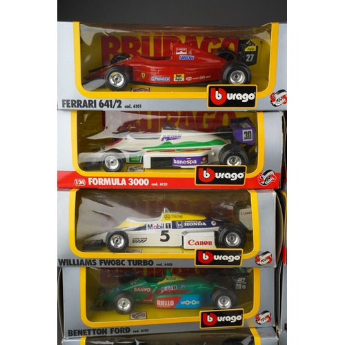 915 - A box of boxed and loose Burago and Corgi toy models comprising 10 boxed 1:24 scale Formula 1 cars a... 