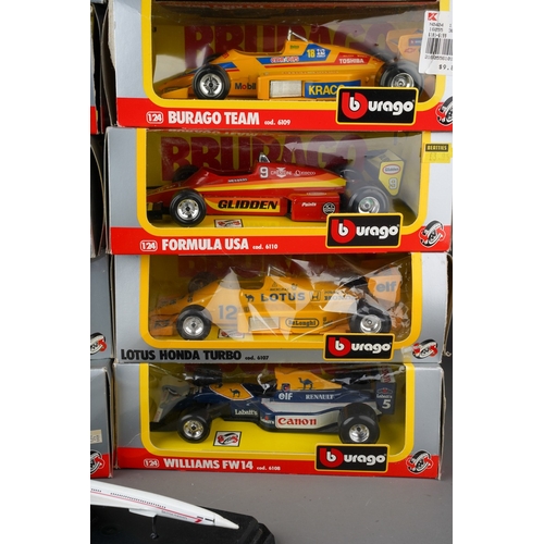 915 - A box of boxed and loose Burago and Corgi toy models comprising 10 boxed 1:24 scale Formula 1 cars a... 