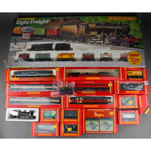 924 - A box of assorted Hornby 00 Gauge railwayana includes open wagons, level crossing, assorted R.886 CL... 