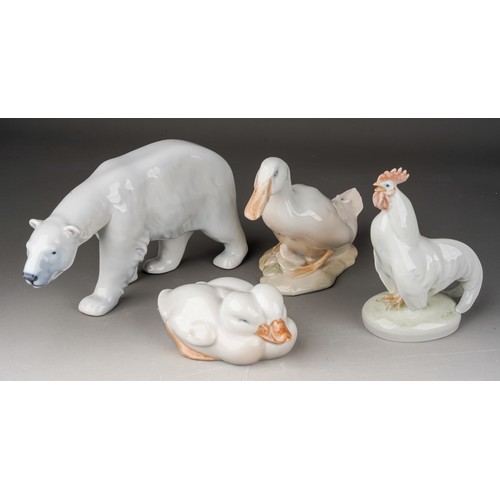 927 - 4 Royal Copenhagen porcelain animal and bird figures comprising 320 Polar Bear, 516 pair of ducks , ... 