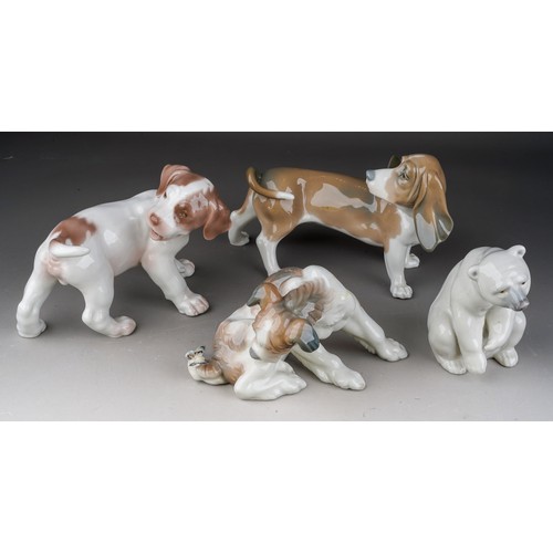 928 - 4 Porcelain animal figures comprising two Lladro dogs and a seated polar bear and a B&G Copenhagen p... 