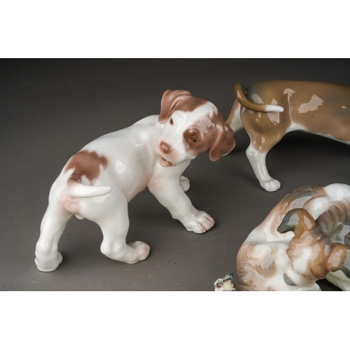 928 - 4 Porcelain animal figures comprising two Lladro dogs and a seated polar bear and a B&G Copenhagen p... 