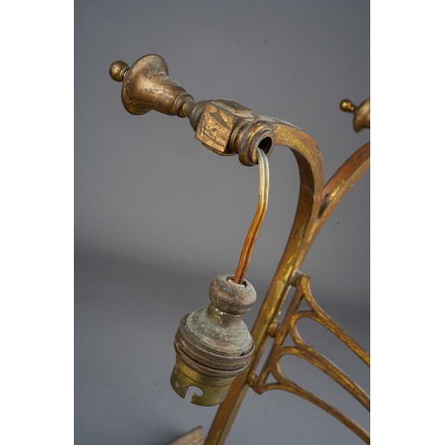 934 - A pair of early 20th Century twin branch brass bracket light fittings