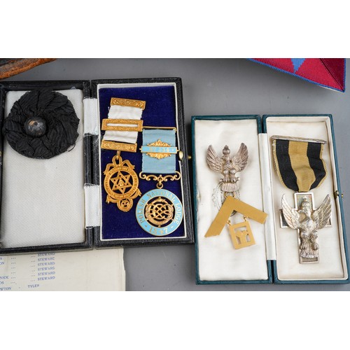 935 - A case of Masonic regalia including a medallion in a 9 ct gold mount with an eagle-shaped broach wit... 