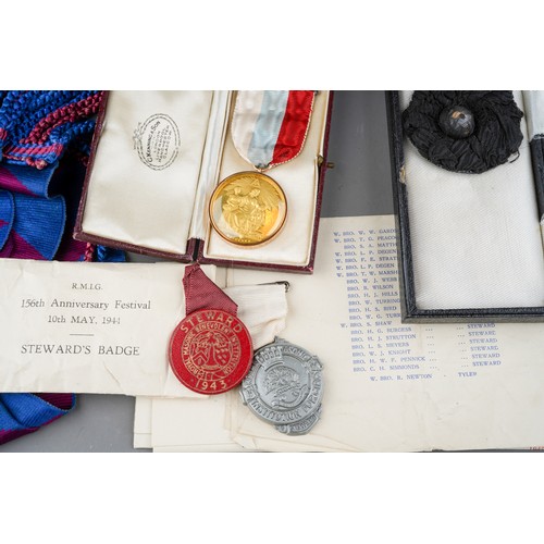 935 - A case of Masonic regalia including a medallion in a 9 ct gold mount with an eagle-shaped broach wit... 