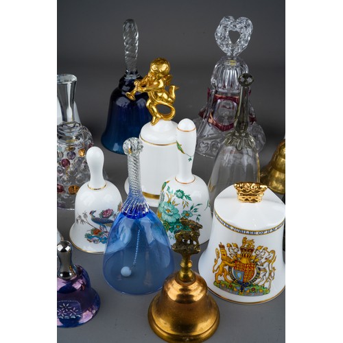 937 - A collection of 26 ceramic, glass and metal ornamental bells including Wedgewood, Jasperware and bon... 