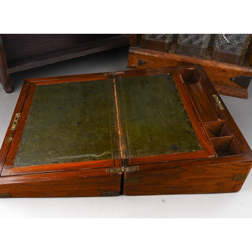 939 - A box of treen etc comprising a late Victorian oak three-bottle tantalus, a circular gilt-framed mir... 