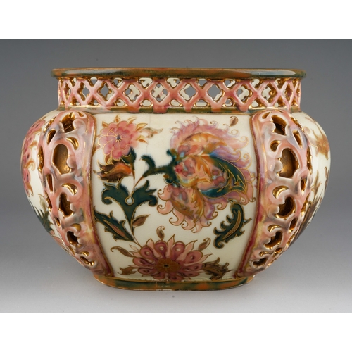 4 - An early 20th century Zsolnay Pecs oval jardiniere, decorated with Isnik style flowers with gilt det... 