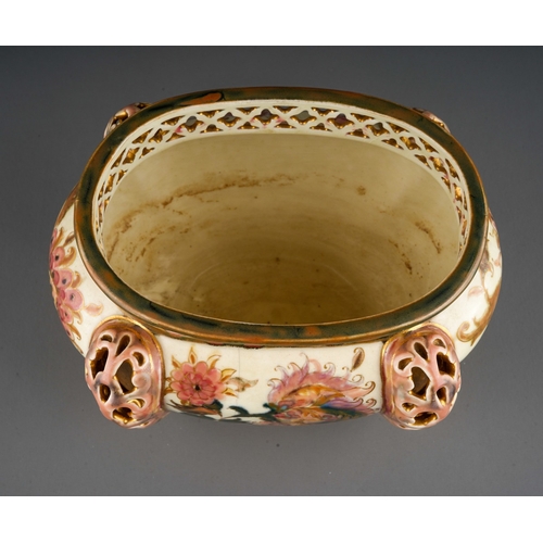 4 - An early 20th century Zsolnay Pecs oval jardiniere, decorated with Isnik style flowers with gilt det... 