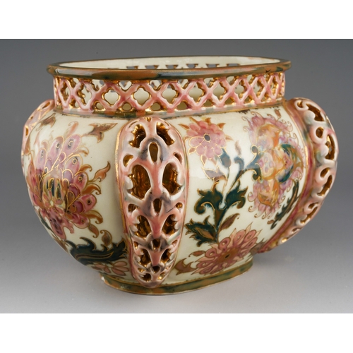 4 - An early 20th century Zsolnay Pecs oval jardiniere, decorated with Isnik style flowers with gilt det... 