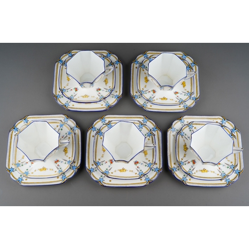 5 - A Shelley Queen Anne shape part tea set in the Garland of Fruit pattern, no. 11705, regd. design 723... 