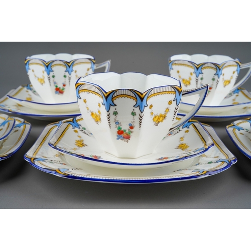 5 - A Shelley Queen Anne shape part tea set in the Garland of Fruit pattern, no. 11705, regd. design 723... 