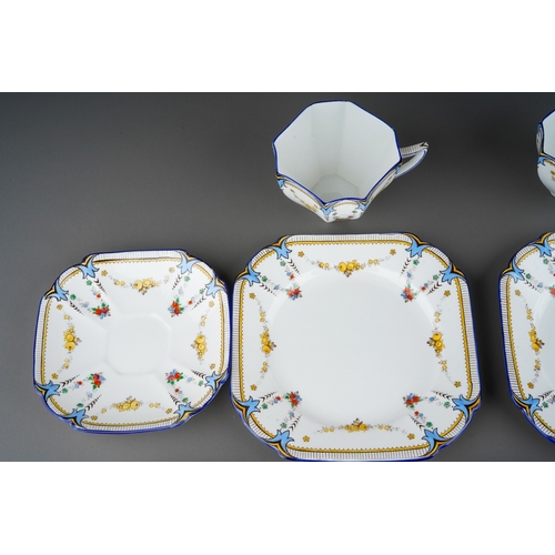 5 - A Shelley Queen Anne shape part tea set in the Garland of Fruit pattern, no. 11705, regd. design 723... 