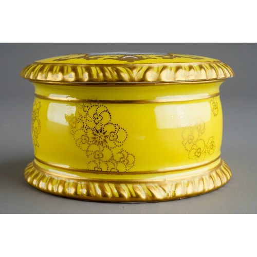 7 - A Royal Crown Derby circular trinket box and cover with gadrooned rims, yellow and gilt ground, the ... 