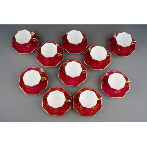 8 - A set of ten Coalport claret and gilt ground way octagonal demi tasse cups and saucers, pattern numb... 