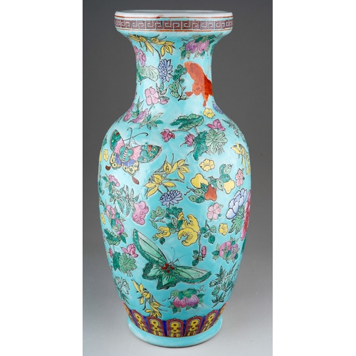 19 - A second half 20th Chinese porcelain baluster vase, turquoise ground polychrome enamelled with flora... 