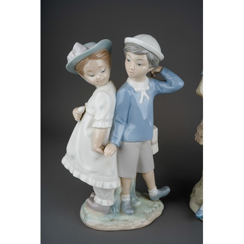 26 - Two Lladro figures, comprising Puppy Love, No.1127, sculpted by Vicente Martinez, issued 1971-1996 a... 