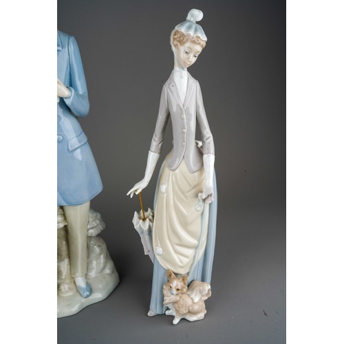 26 - Two Lladro figures, comprising Puppy Love, No.1127, sculpted by Vicente Martinez, issued 1971-1996 a... 