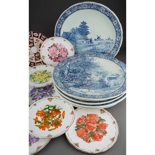 35 - Six large blue and white Delft chargers by Boch with Dutch landscapes, a deer hunt and a couple in a... 