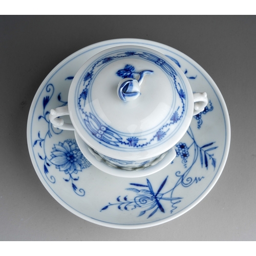 49 - A 20th century Meissen porcelain Blue Onion pattern twin handled chocolate cup with cover with sauce... 