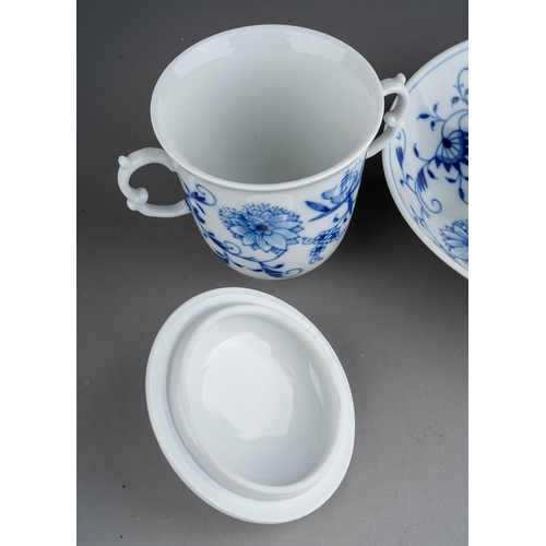 49 - A 20th century Meissen porcelain Blue Onion pattern twin handled chocolate cup with cover with sauce... 