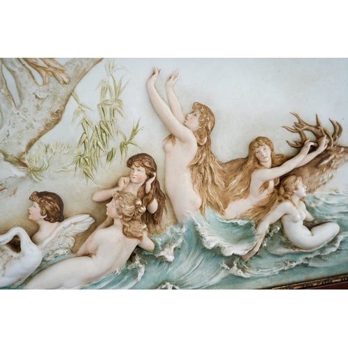 51 - A German porcelain plaque modelled with River Nymphs with Swan and Stag., stamped Carl Ens and numbe... 